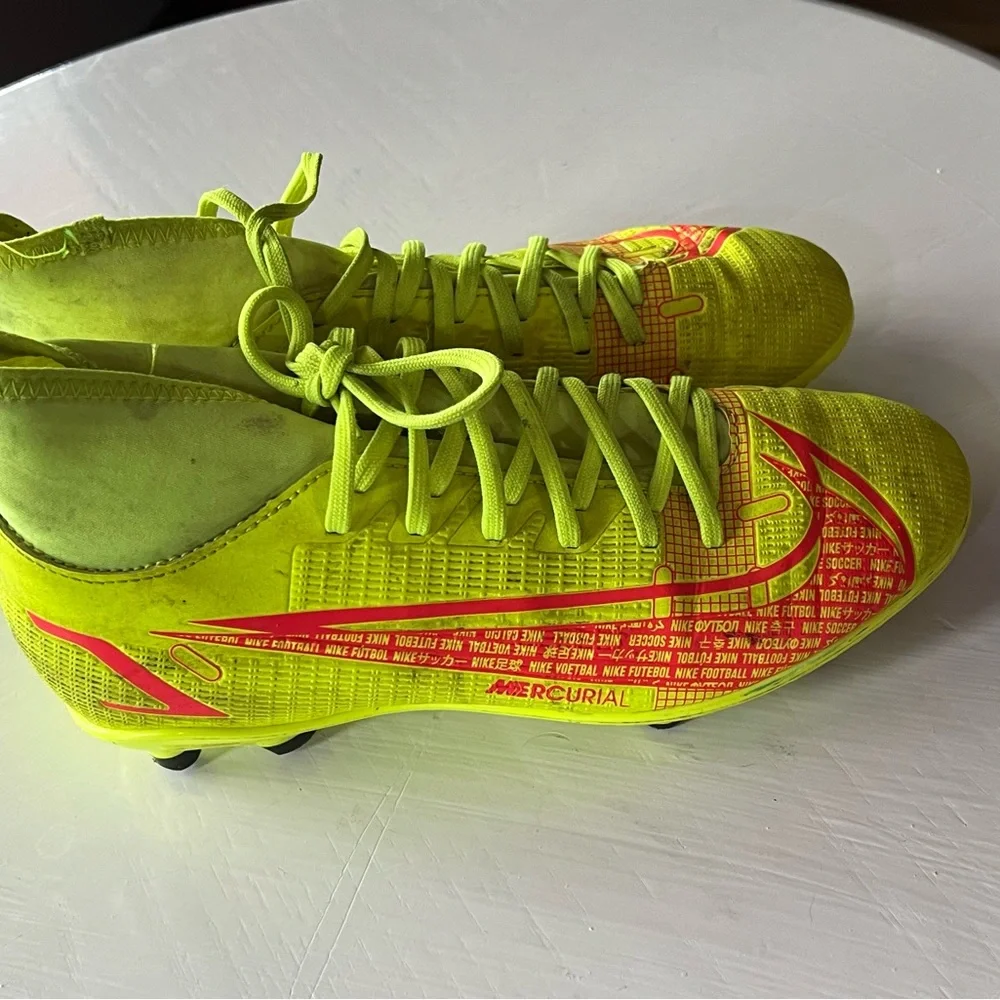 Neon yellow soccer cleats